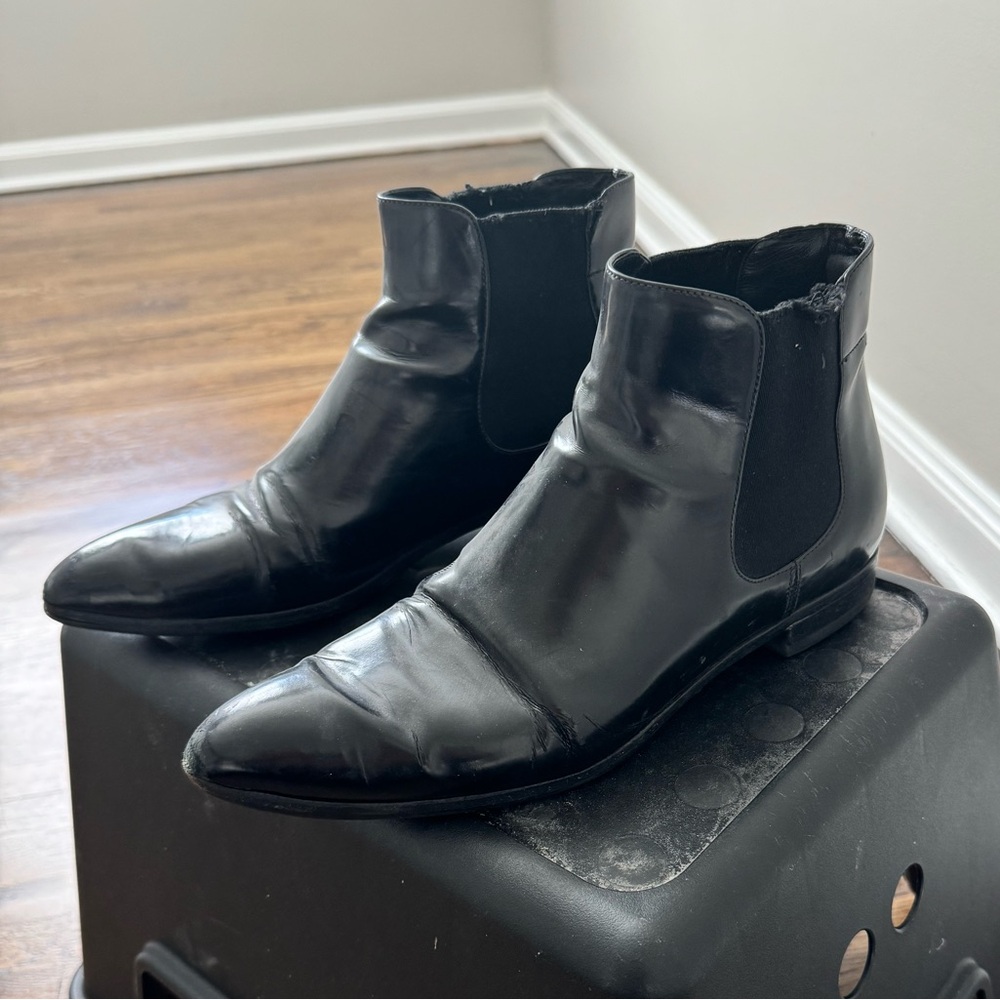 Prada black leather pointed booties